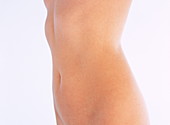 Naked woman's abdomen