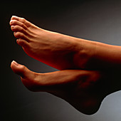 Side view of the healthy feet of a woman