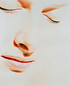 Woman's face with closed eyes