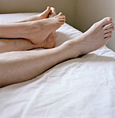 Couple's bare feet