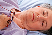 Elderly woman sleeping