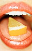 Slice of lemon on tongue