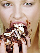 Woman eating cake