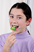 Girl eating a lollipop