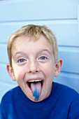 Boy with a blue tongue