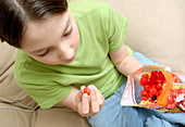 Girl eating sweets