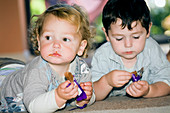 Children eating chocolate bars