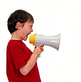 Boy shouting into a megaphone