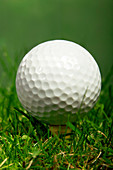 Golf ball on a tee