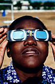 Watching a solar eclipse,Angola