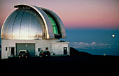 Moon over the UK Infrared Telescope dome,Hawaii