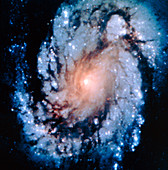 Post-servicing HST image of M100 galaxy