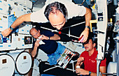 Astronaut fighting against weightlessness
