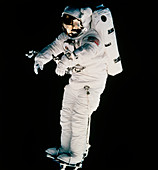 Astronaut Wisoff on RMS arm,STS-57 EVA