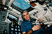 Astronaut Gutierrez with cameras,STS-59