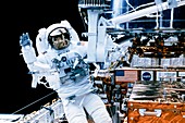 Astronaut spacewalks to repair Shuttle Telescope