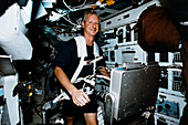 Astronaut Hawley running on treadmill on STS-093
