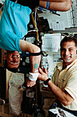 Astronaut Wolf taking blood sample,SLS-2
