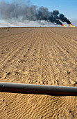 Smoke over desert,Saudi Arabia