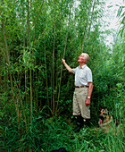 Farmer in willow fuelwood plantation in Clanfield