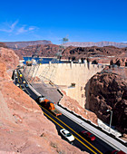 Traffic crossing a hydroelectric dam