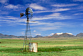 Windmill on prairie land,New Mexico
