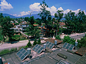 Solar water heaters on a rooftop in Nepal