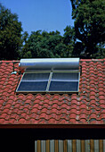A roof mounted solar heating system