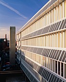 Solar panels integrated into face of building