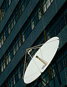 Satellite dish outside tower block in London
