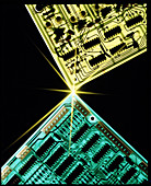 Two circuit boards meeting at a spot of light