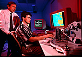 Scientist running a tsunami computer simulation