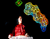 Scientist w/computer 3D image of complex molecule