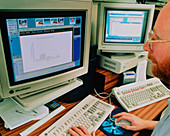 Statistician works on computer graphical data