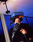 Wearing virtual reality helmet and glove