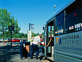 Electric bus being recharged at terminus