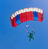 Parachutist under ram-air canopy