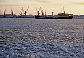 Ship and cranes in an Arctic port
