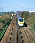 Eurostar Channel Tunnel trains passing on a track