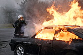 Firefighter extinguishing a fire