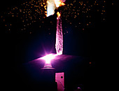 Plasma torch cutting through steel
