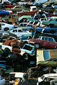 Landscape covered with scrap motor cars