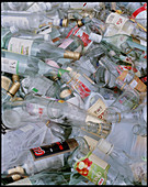 Glass bottles await recycling at a bottle bank