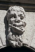 Sculpture of a deformed human head