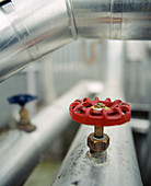 Tap on pipework at chemical factory