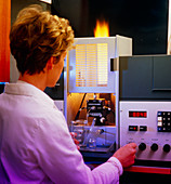 Analytical chemist using AA spectrometer
