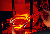 Volumetric flasks and a funnel in a laboratory