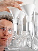 Chemist with glassware