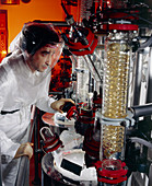 A chemist working on aerosol manufacture