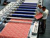 Rotary printer printing a pattern onto textiles